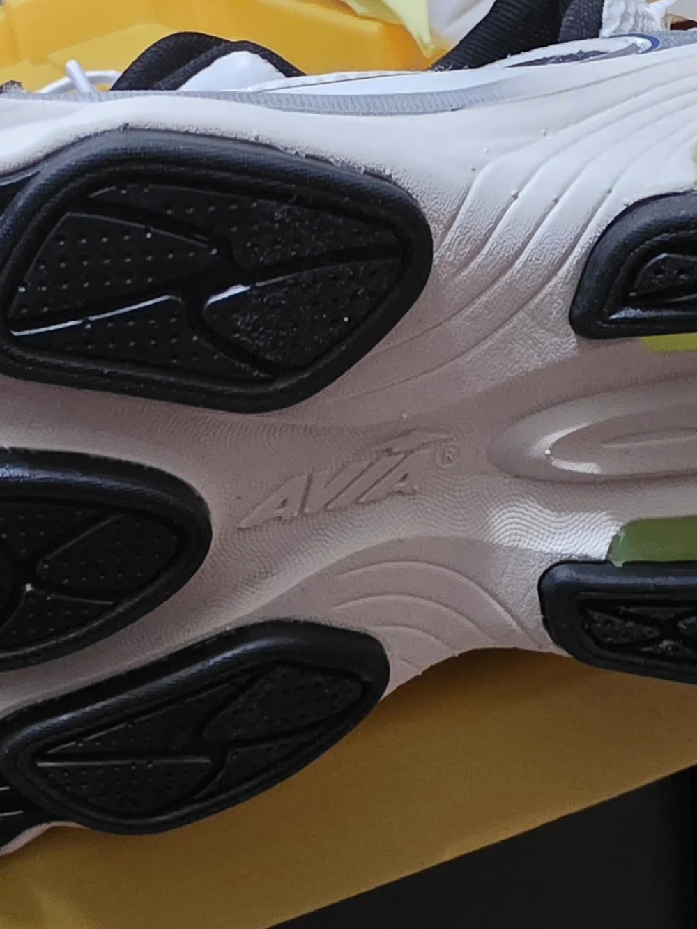 Avia White and Black Athletic Sneakers with Blue Accents
